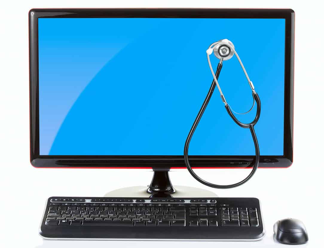 A stethoscope on a computer monitor depicting the automation of healthcare workflows.