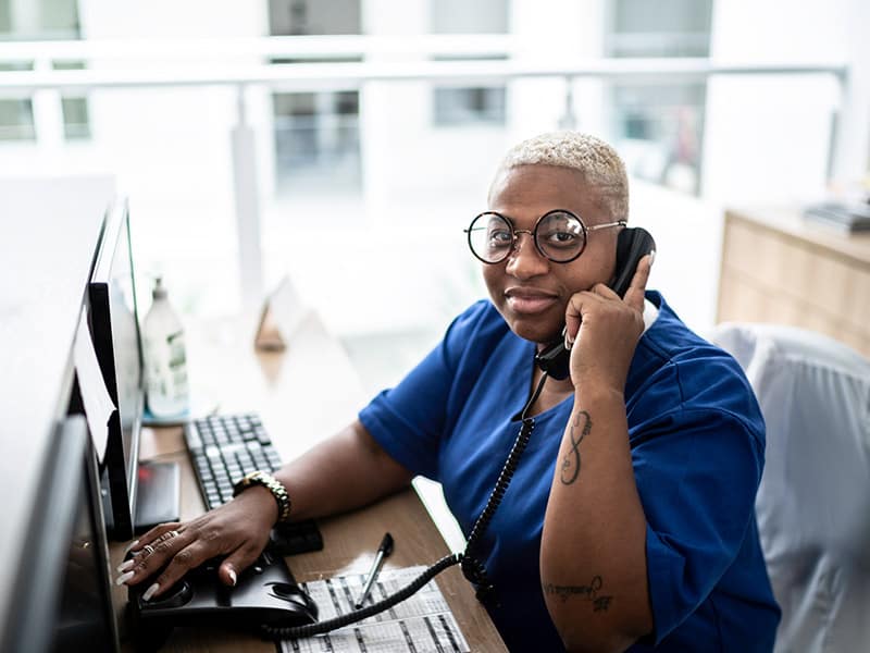 A care manager calling a patient after receiving the integrated ADT feed notification.